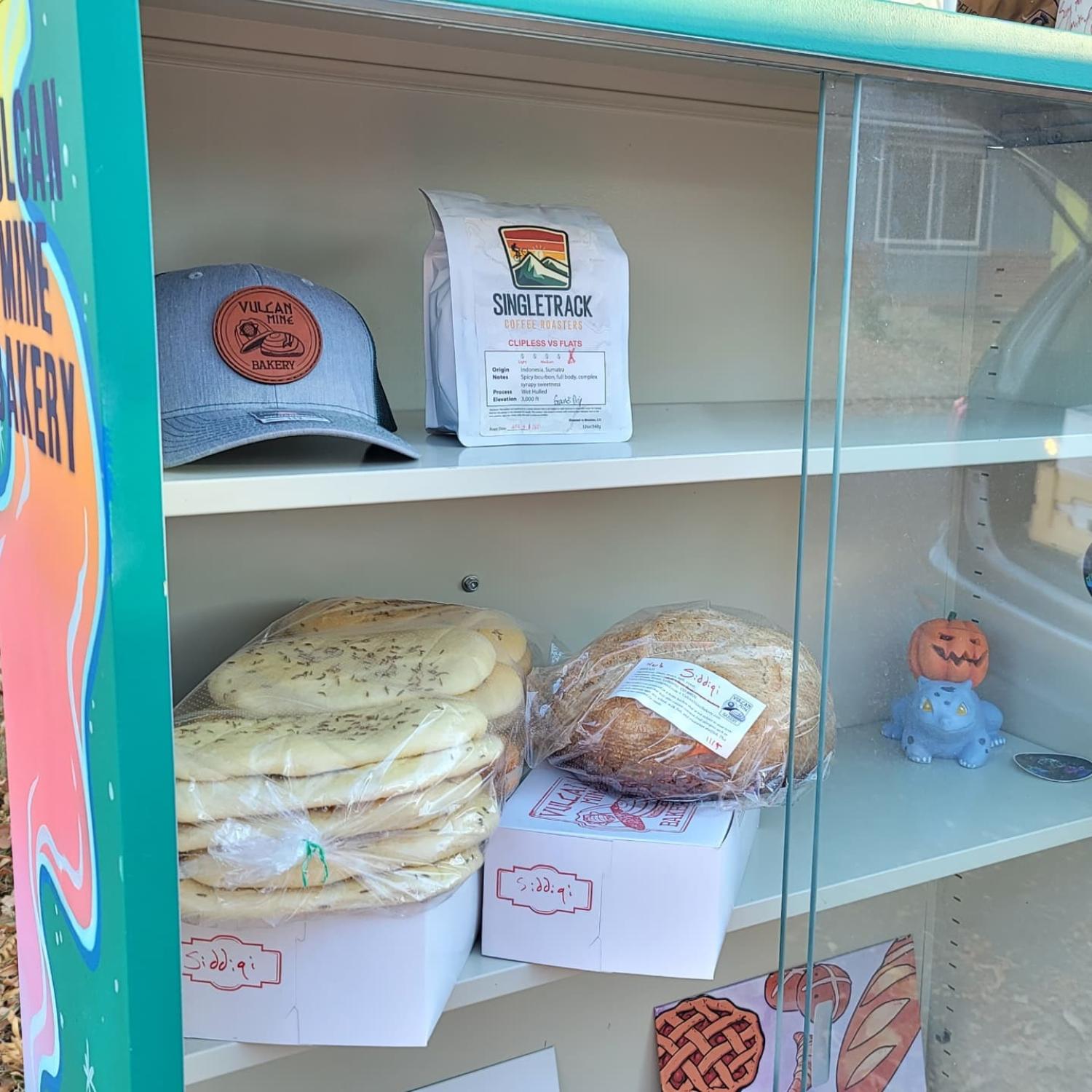 American and Afghan baked goods in a small, glass-doored kiosk
