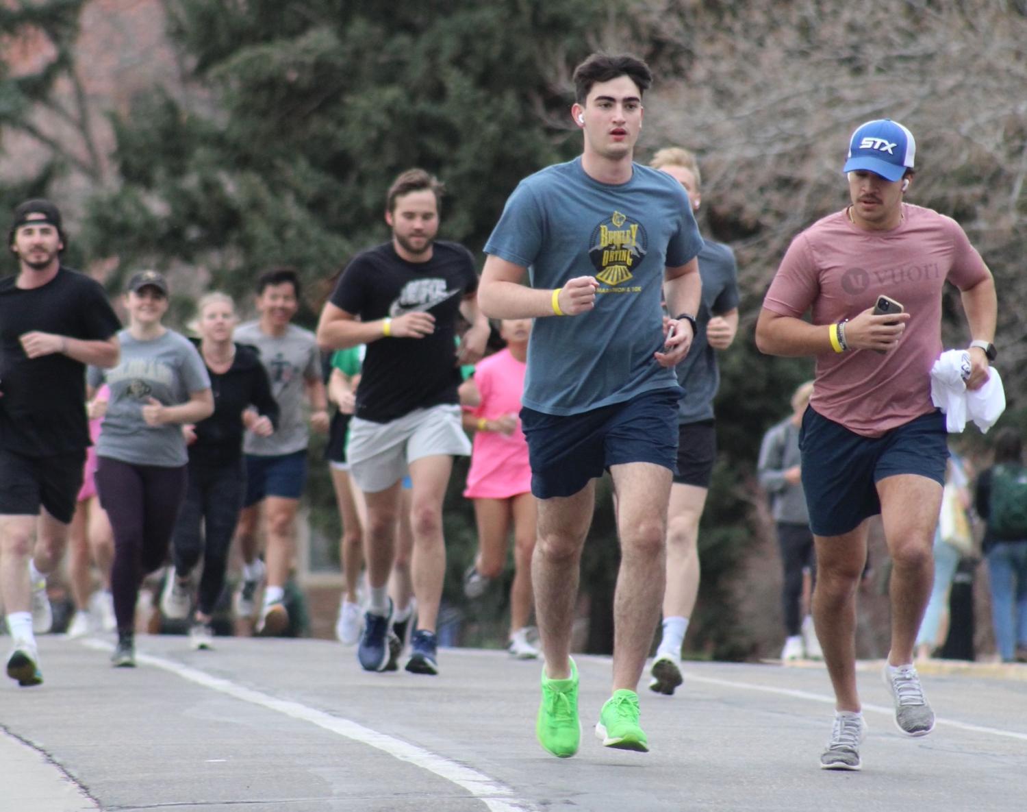 CU Boulder students running in a 5K to raise money for cancer