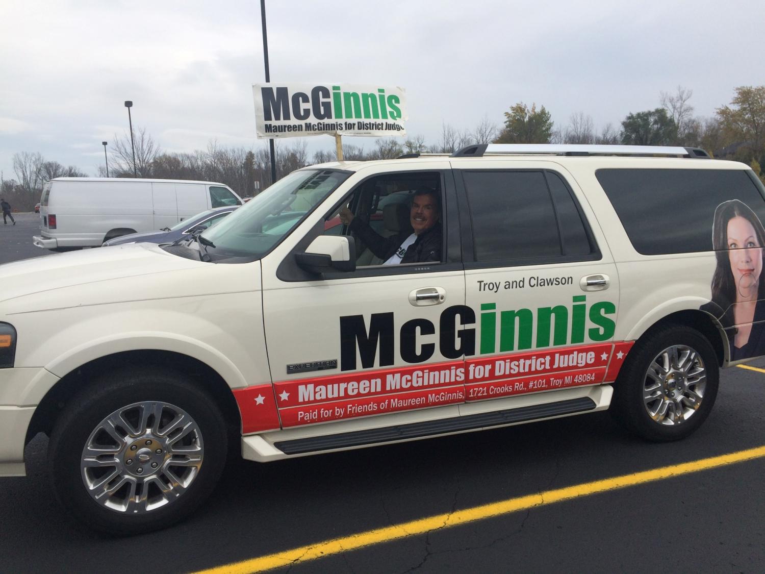 Don McGinnis in white SUV campaigning for Maureen McGinnis