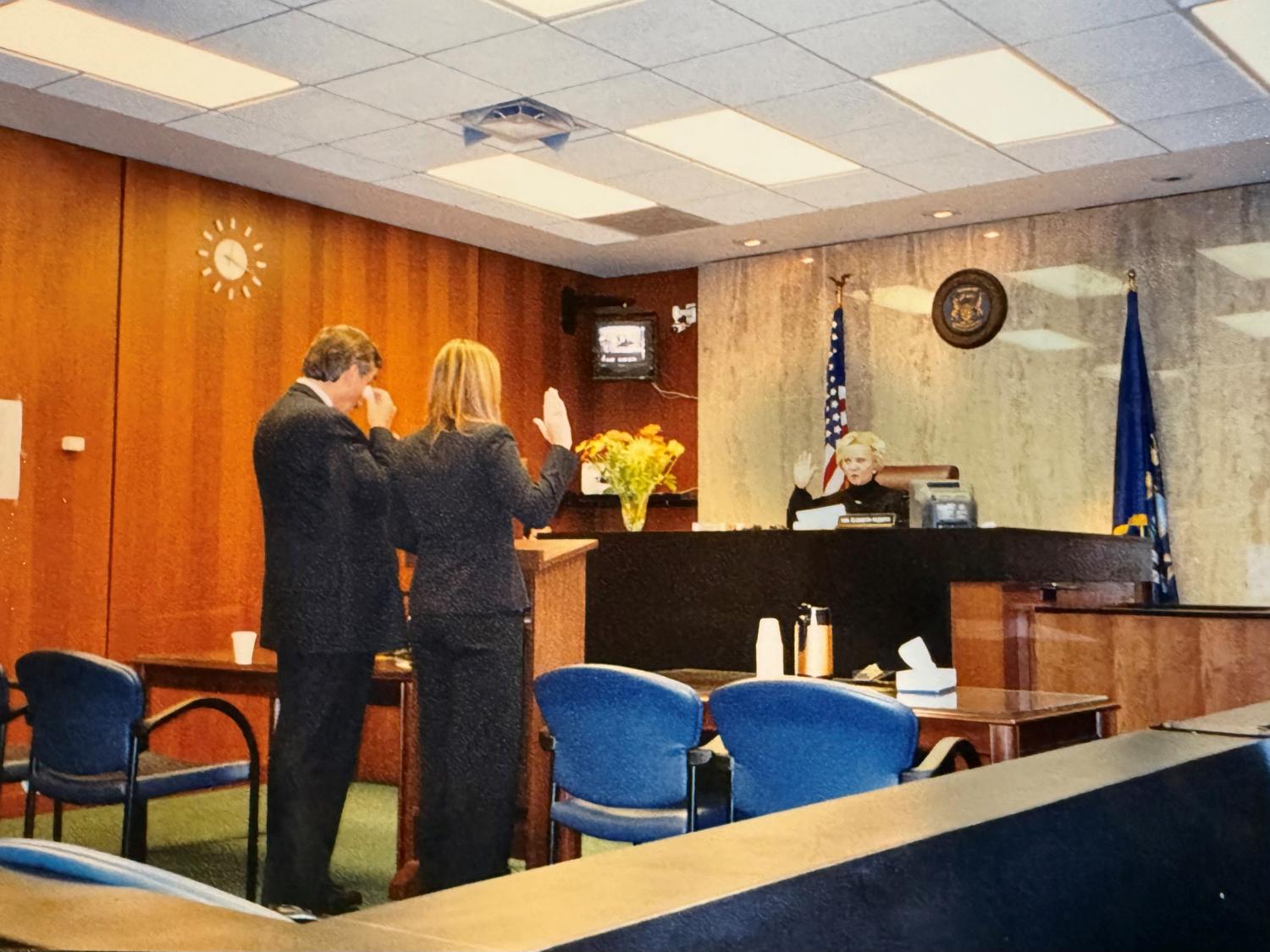 Don and Maureen McGinnis in courtroom facing judge