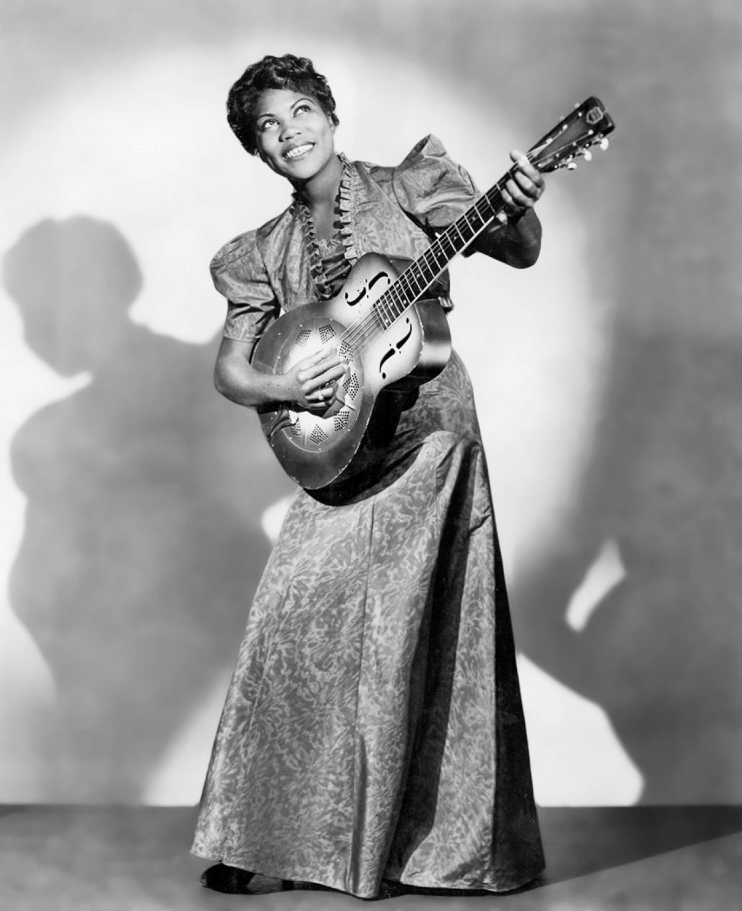 Sister Rosetta Tharpe playing the guitar