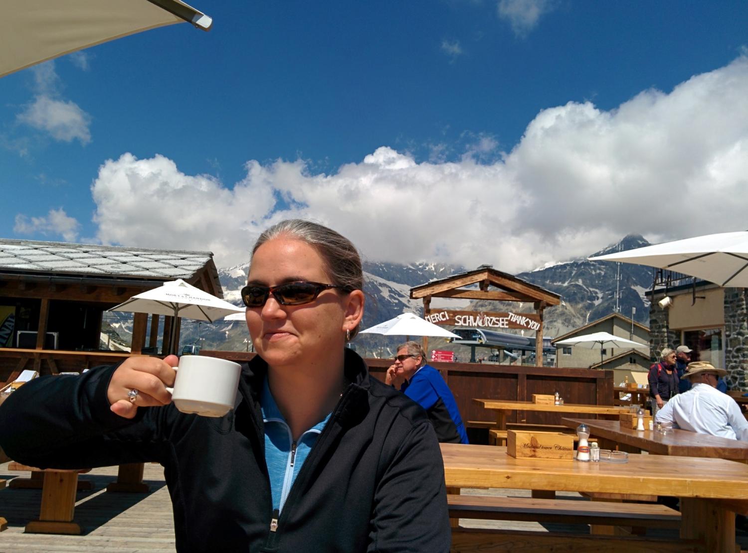Kate Fischer drinking a cup of coffee