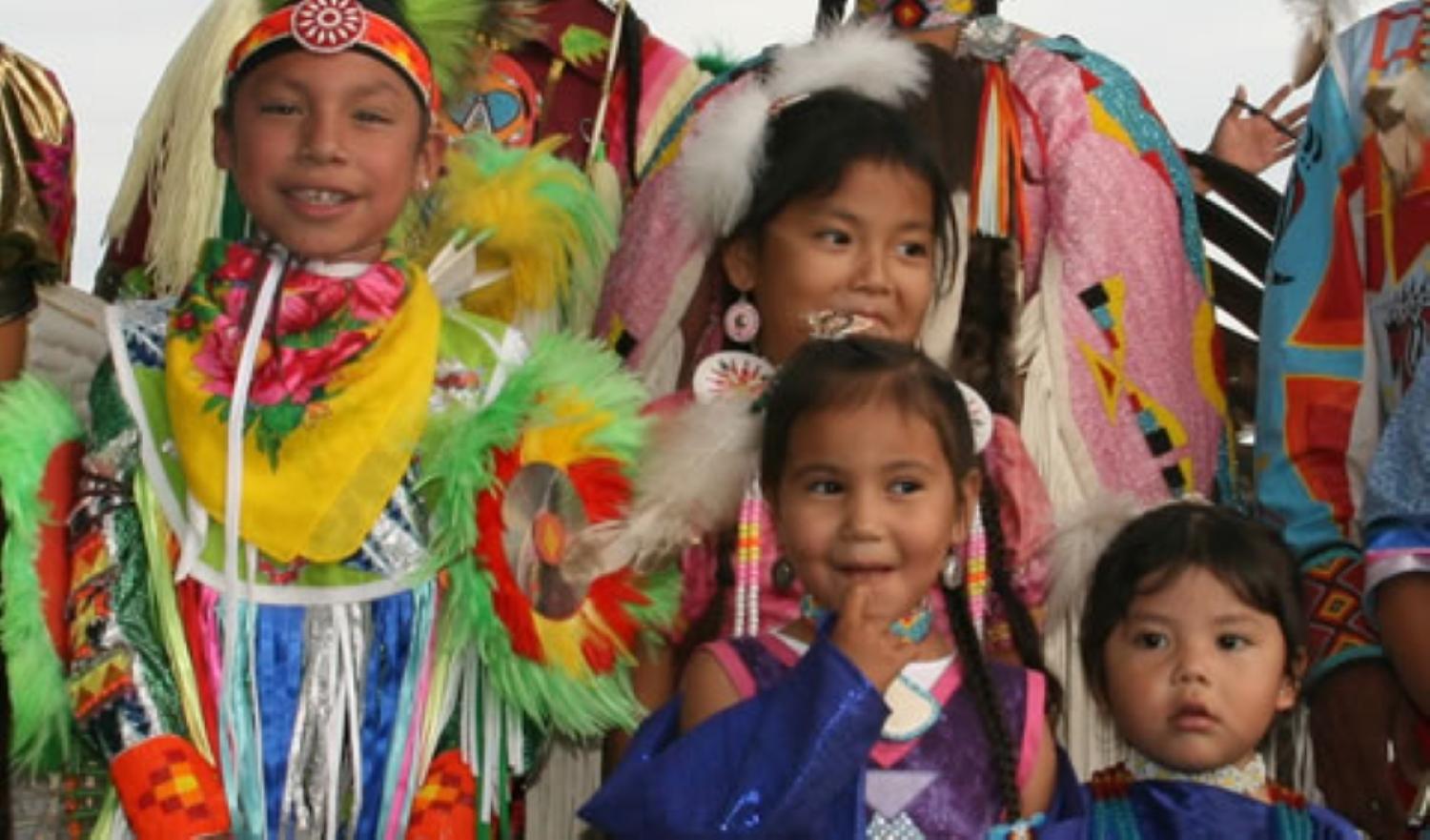 young Arapaho dancers in traditional garb