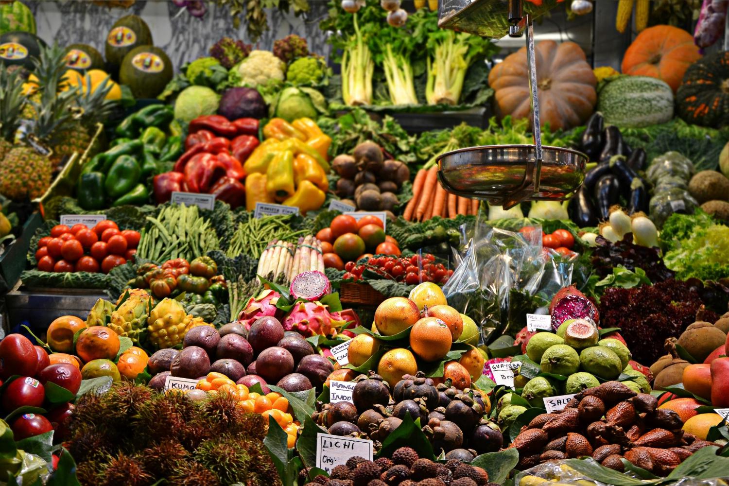 fruits and vegetables stacked at market