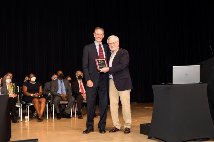 Ken Wright receiving his award