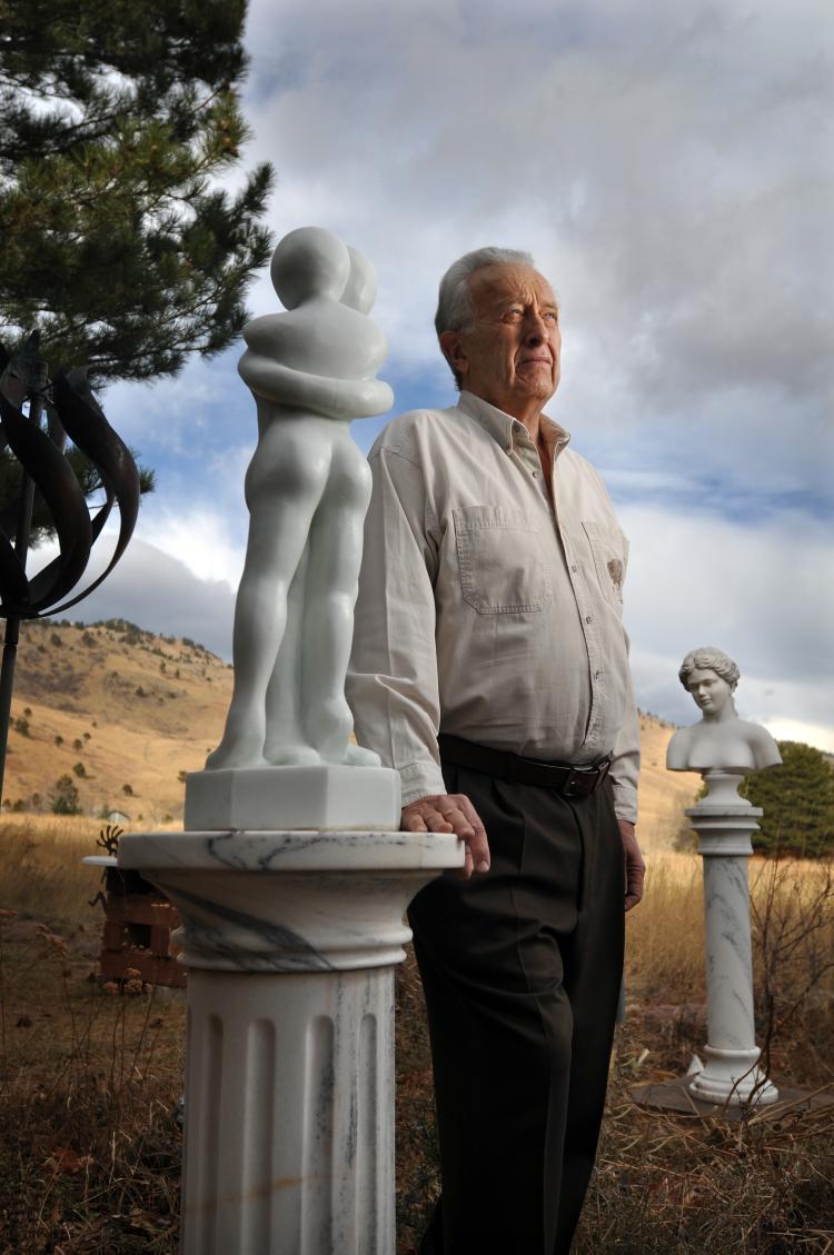 Bob Sievers and some of his marble sculptures. Photo by Glenn Asakawa. 