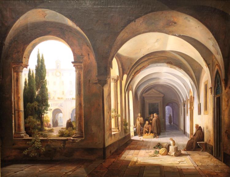 Franciscan monks in the cloister of Santa Maria.