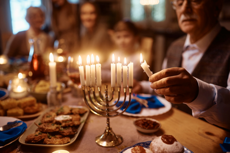 Hanukkah family meal and menorah lighting