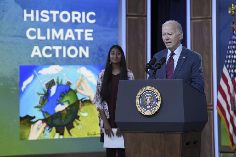 President Joe Biden behind podium
