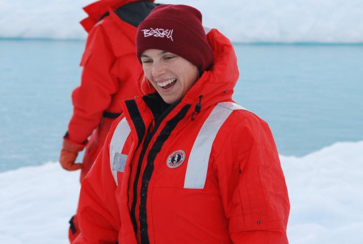 Cassandra smiling while on expedition in the Antarctic.