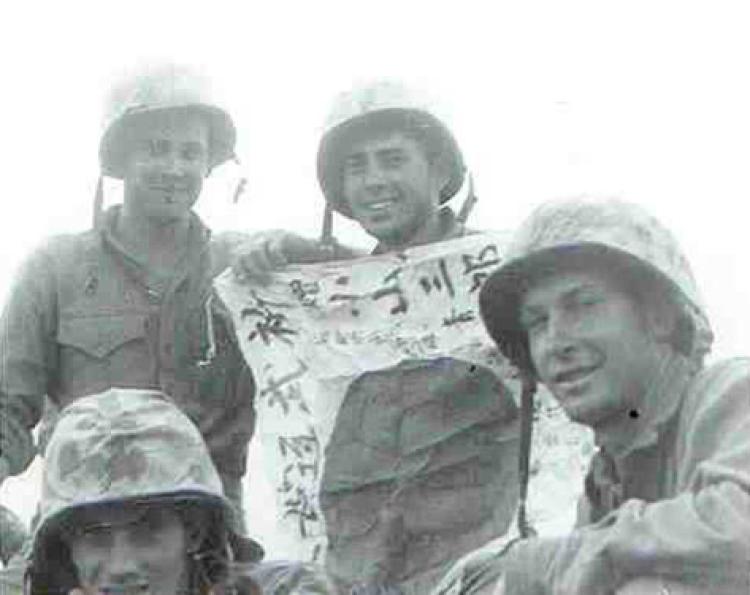 Dick holding a Japanese flag