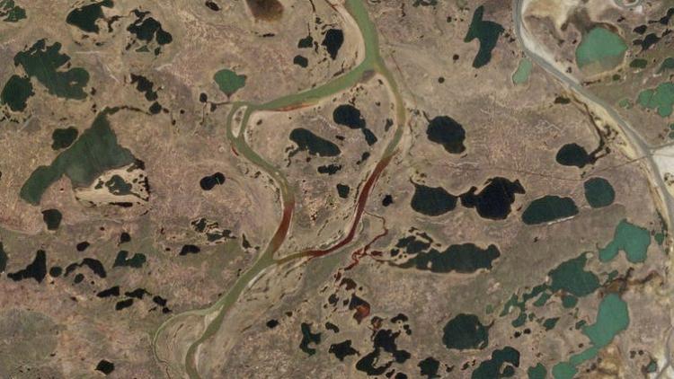 A satellite image shows the Norilsk oil spill flowing into neighboring rivers