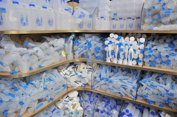 Shop selling consecrated water in the city of Lourdes. BSIP/Universal Images Group via Getty Images