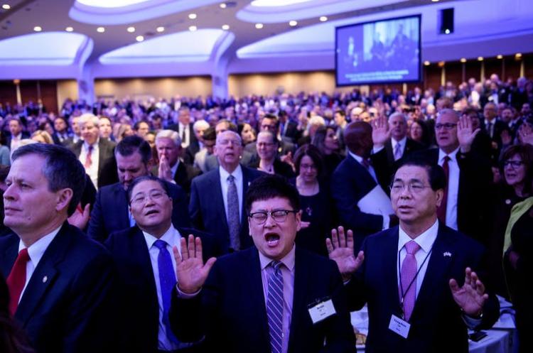 People sing ‘Amazing Grace’ during the National Prayer Breakfast in 2019