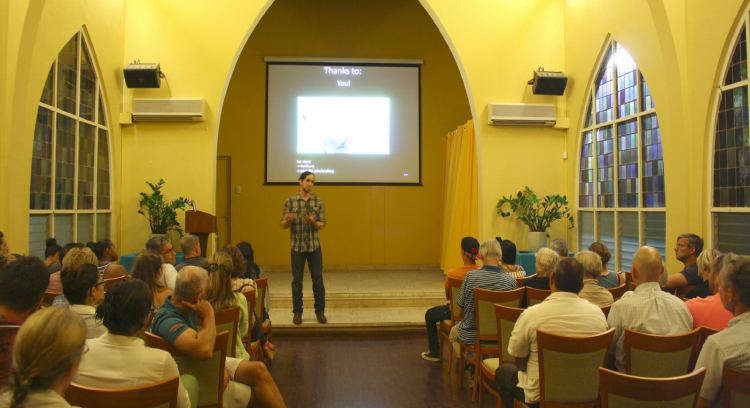 Mike Gil giving a talk at the University of Aruba.