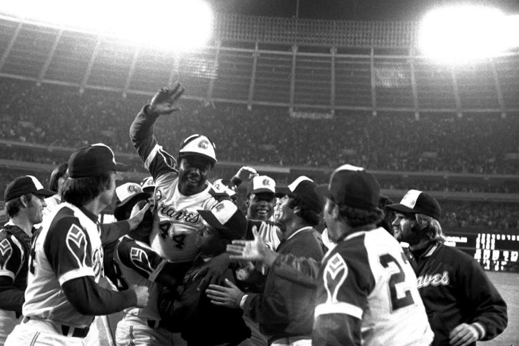 Hank Aaron celebrating 715th home run with Braves teammates