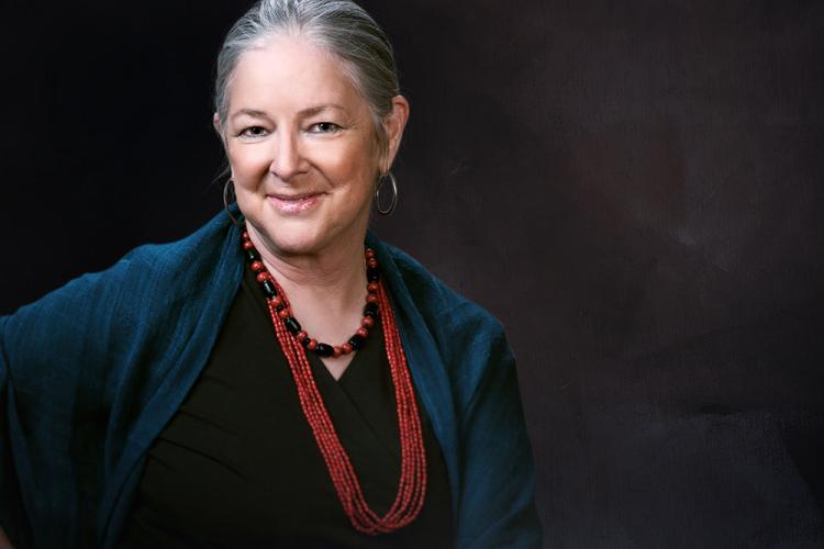 A portrait image of Linda Hogan with a blackground