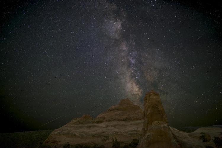 The Milky Way as seen in August; the galactic center is just above and to the left of the spire