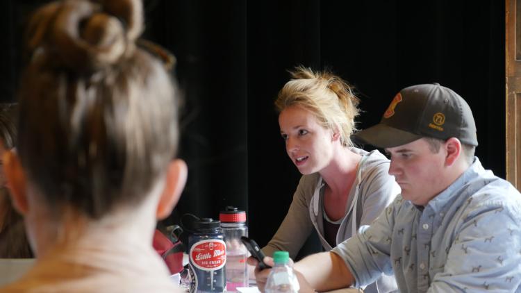 Actor Kelsey Didion at a table reading of Douglas Langworthy's translation of Henry VI, Part 2.Jackson Xia for CU Presents.