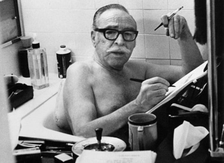 Dalton Trumbo writing in bathtub