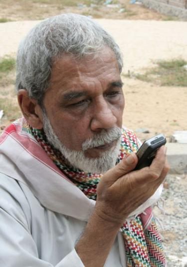 Islam man on a cell phone