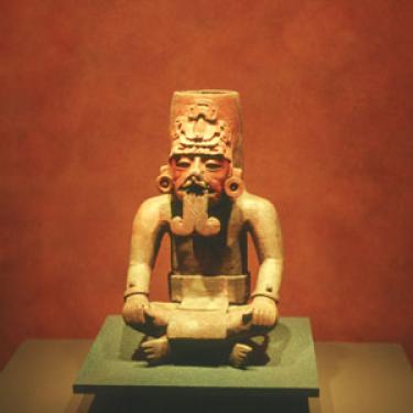 Zapotec urn depicting a Rain God impersonator. Photo by Arthur Joyce.