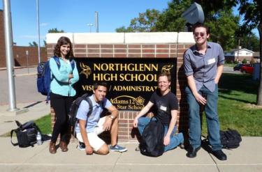 Literary Buffs (left to right) Sydney Chinowski, André Gianfrancesco, Sean Guerdian and Lukas DeVries strike a pose outside Northglenn High School, where they coached future college students on preparing college-level papers.