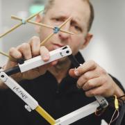 Dor Abrahamson of the University of California at Berkeley demonstrates the use of the Quad, a device he and colleagues at CU Boulder and elsewhere created to help the blind or visually impaired learn geometry.