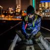 man working on construction project at night