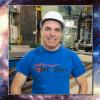Headshot of Jamie Nagle over illustrated imagining of the Big Bang