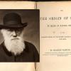 portrait of Charles Darwin over title page of On the Origin of Species