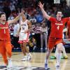 Elated Clemson players celebrate win over Arizona players