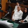 Anniesa Hasibuan at defendant table in courtroom