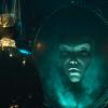 Evil queen speaking to magic mirror in movie Snow White
