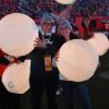 John and Giovanna Ruffolo holding illuminated balloons