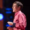 Woman presenting at a TED talk