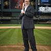 CU alumnus Tom Garfinkel stands on the mound of Chase Field, the home of the Arizona Diamondbacks for whom he is the the executive vice president and chief operating officer.