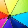 image of a multi-colored umbrella to represent the LGBTQ+ community