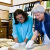 Marjorie McIntosh working with books