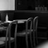 A person sitting alone in a room