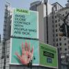 A billboard with COVID guidance