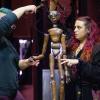 Two students with a mannequin