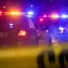 Police cars and warning tape