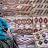 Mae Morgan, a Navajo weaver, is one of several weavers who produces rugs for an auction that raises funds for the Museum of Natural History at CU-Boulder. Photo courtesy of Harry Jackson Clark Sr.