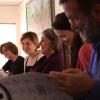Jane Butcher (center) works with students and staff to prepare for the 61st annual Conference on World Affairs. The conference begins April 6th, and is comprised of more than 200 sessions.