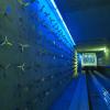 Kinetic Light/Air Curtain graces the terminal train tunnels at The Denver International Airport. The piece was created by Antonette Rosato and her husband, William Jackson Maxwell. Photo courtesy of Denver International Airport.