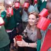 Josette Sheeran, executive director of the U.N. World Food Programme, visits with students from the Stara School in Kenya. credit: WFP/Peter Smerdon