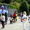 People wearing masks and social distancing at the Sanctuary of Our Lady of Lourdes on May 30, 2020. Laurent Dart/AFP via Getty Images