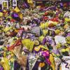 Flowers and Kobe Bryant memorabilia are placed in front of Staples Center in Los Angeles, CA. 
