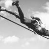 Gil Cruter clearing a high jump.
